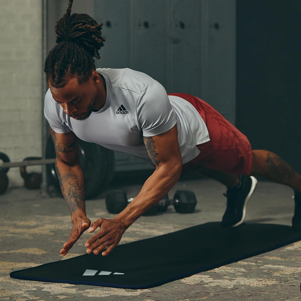 adidas 10mm Extra Thick Training Mat with Carrying Strap and Non-Slip Textured Base - Cushioned Workout Mat for Home Gym, Floor Workouts, and Intense Exercises - Portable and Durable