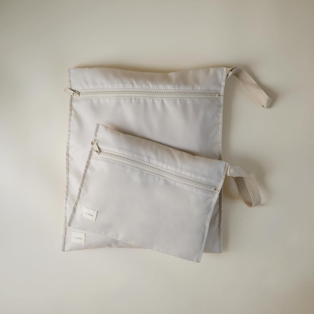 mushie Water Resistant Wet Bags | Large & Small Reusable Storage Bag for Baby Items and Travel | Zippered Pockets with Handle | Machine Washable, Set of 2 (Fog)