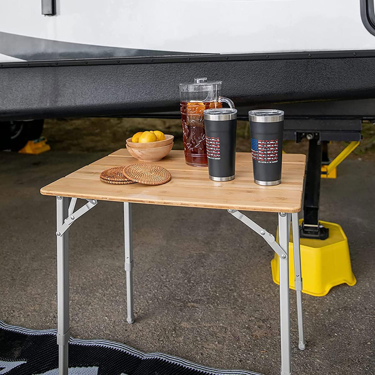 Camco Bamboo Folding Camping Table with Aluminum Legs - Natural Bamboo Top Measures 25 ½ x 19 ¾-inches & Supports Up to 85lbs - Lightweight for Added Portability & Includes Storage Bag (51895)