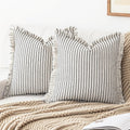 YEENAASY Throw Pillow Covers 18x18 Boho Striped Pillow Cases with Tassel