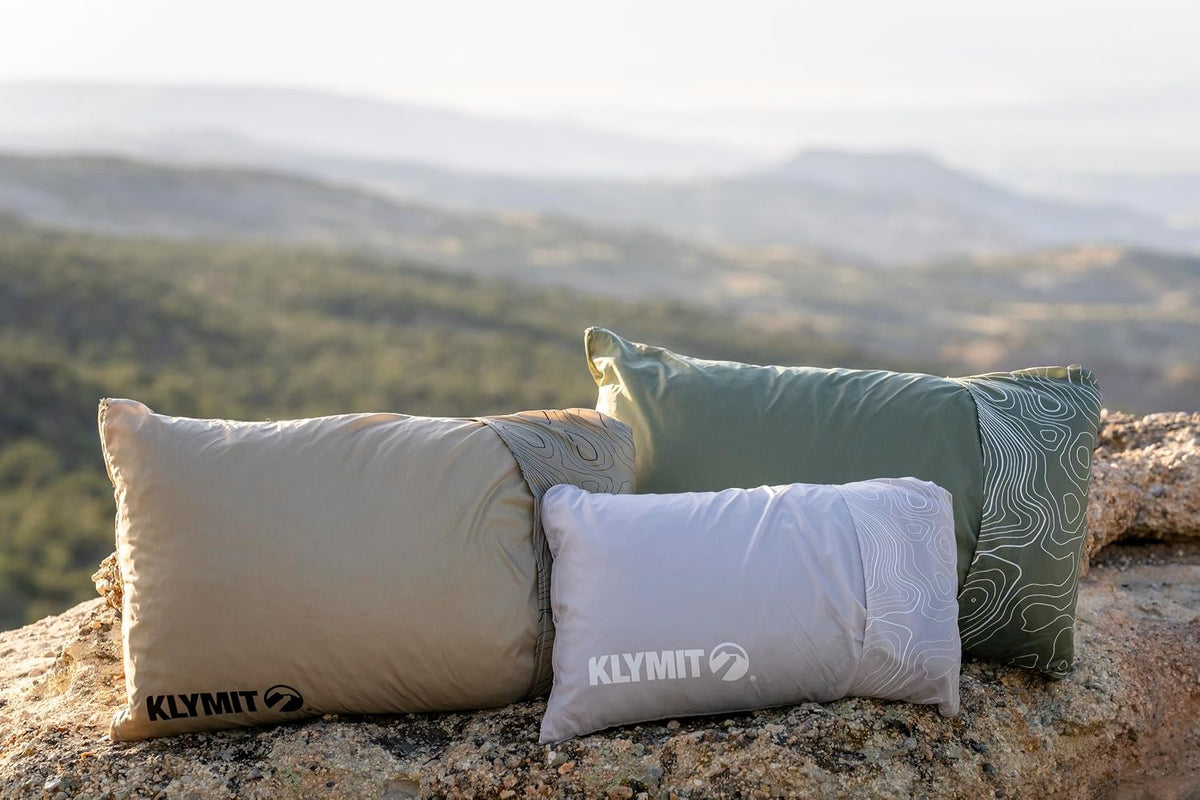 KLYMIT Drift Camping Pillow | Lightweight, Travel Head Rest for Sleep Filled with Shredded Memory Foam, Reversible Outer Cover for Extended Use, Regular Size — Tan
