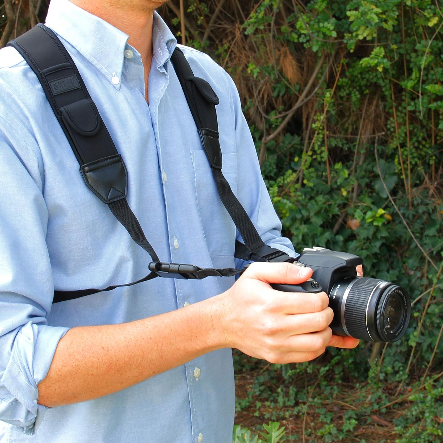 USA Gear DSLR Camera Strap Chest Harness with Quick Release Buckles, Black Neoprene Pattern and Accessory Pockets - Compatible with Canon, Nikon, Sony and More Point and Shoot and Mirrorless Cameras