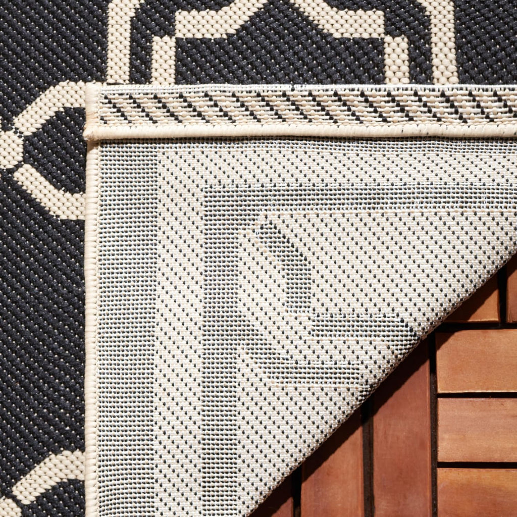 SAFAVIEH Courtyard Collection CY6916 Indoor/ Outdoor Non-Shedding Easy Cleaning Patio Backyard Porch Deck Mudroom Accent Rug, 2' x 3'7", Black / Beige