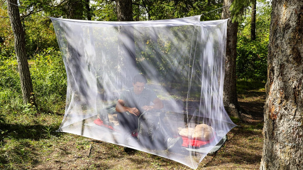 Coghlan's Rectangular Mosquito Net – Lightweight Mesh Canopy for Camping, Travel, and Outdoor Use – Includes Tie Loops, Carry Bag, Twine, Hooks, Anchors, Nails – White, 78" x 32" x 59"