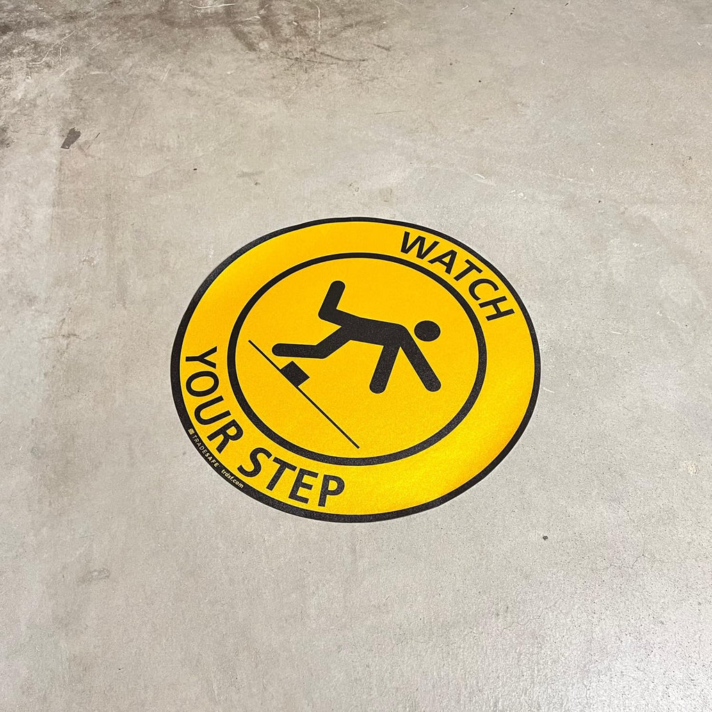 TRADESAFE Watch Your Step Anti-Slip Floor Sticker - Watch Your Step Safety Caution Sign, Peel and Stick Adhesive Vinyl Sign, ANSI-Compliant, 17” Diameter Round Sticker