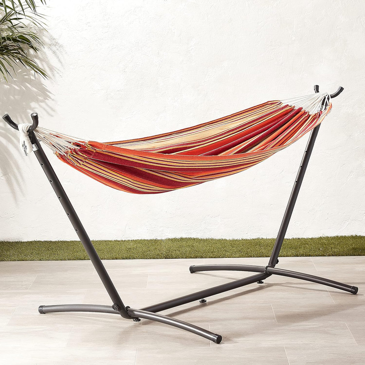 Amazon Basics Double Hammock with 9-Foot Space Saving Steel Stand and Carrying Case, 2 Person, 450 lb Capacity, Sunset Orange Stripe, 110" x 47" x 43", Outdoor